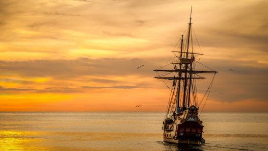 tall ship going into the sunset