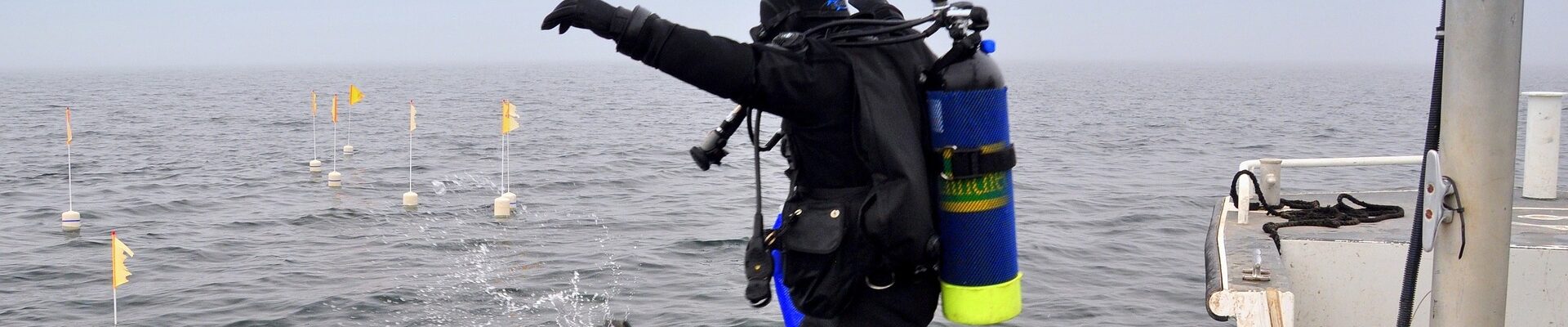 scuba diver jumping
