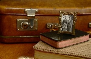 Suitcase, old family photo, and other valuables