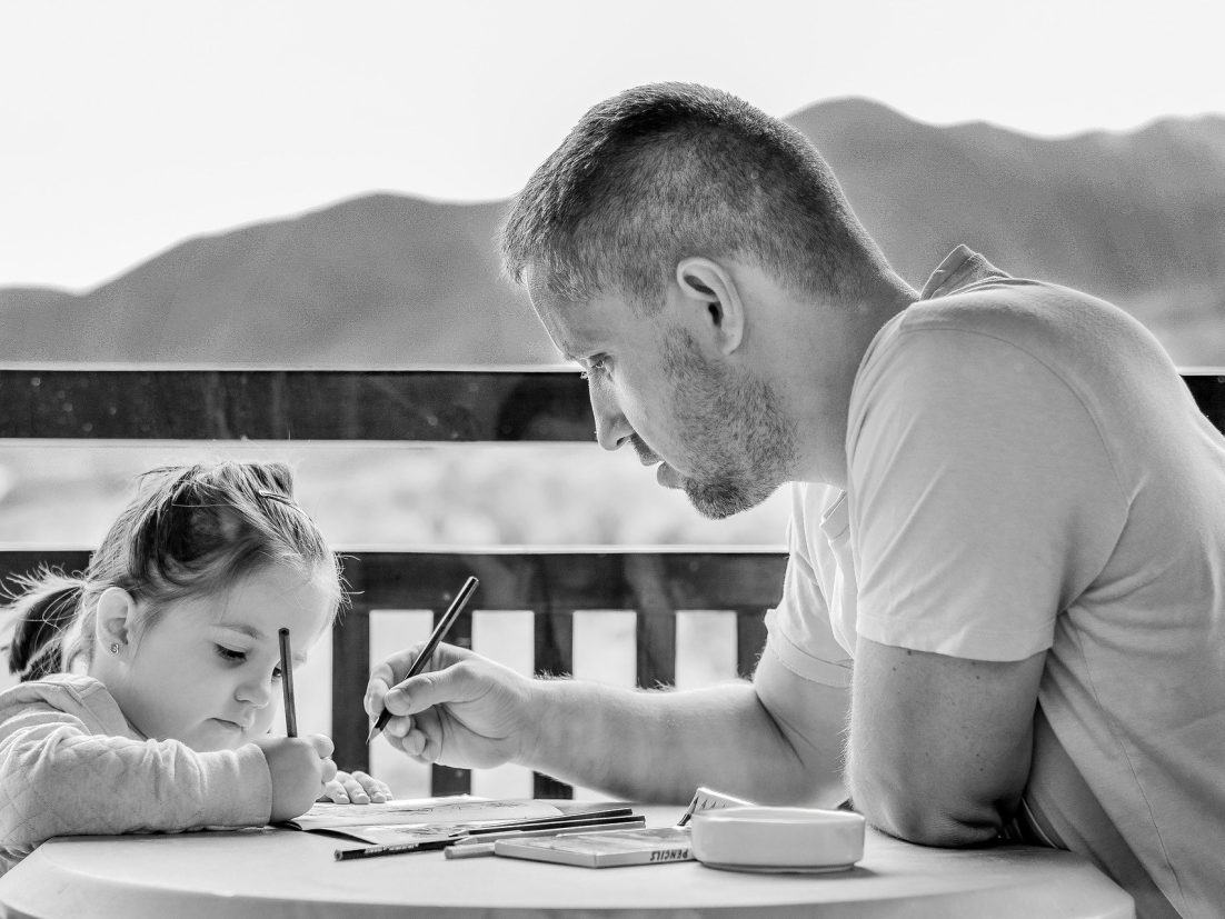 Father coloring with daughter. Crafts are a great non-threatening way to discuss loss with children. https://every1dies.org
