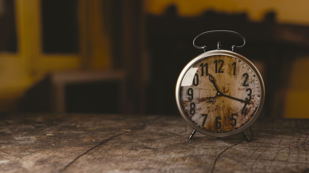 A image of a vintage clock on wood table with text overlay: The real experts on dementia caregiving are the family members who do it 36 Hours a Day. 
Every Day.
Learn about caring for a partner with dementia at https://every1dies.org 