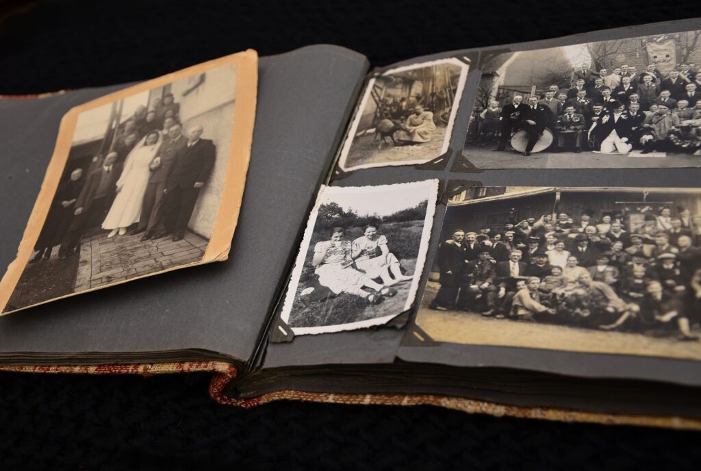 A photo album with black and white images.  (Photo by Conger Design)