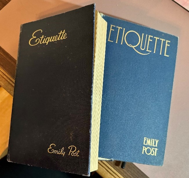 Two hardcopy books of Emily Post's Etiquette