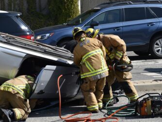 Firemen extracting a victim from an overturned car. We talk about traumatic grief in this episode, which can result when someone dies unexpectedly
