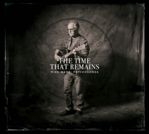 Singer/songwriter Mike Ward holding his guitar in a black and white image with a clock behind him. Text says "The Time that Remains"